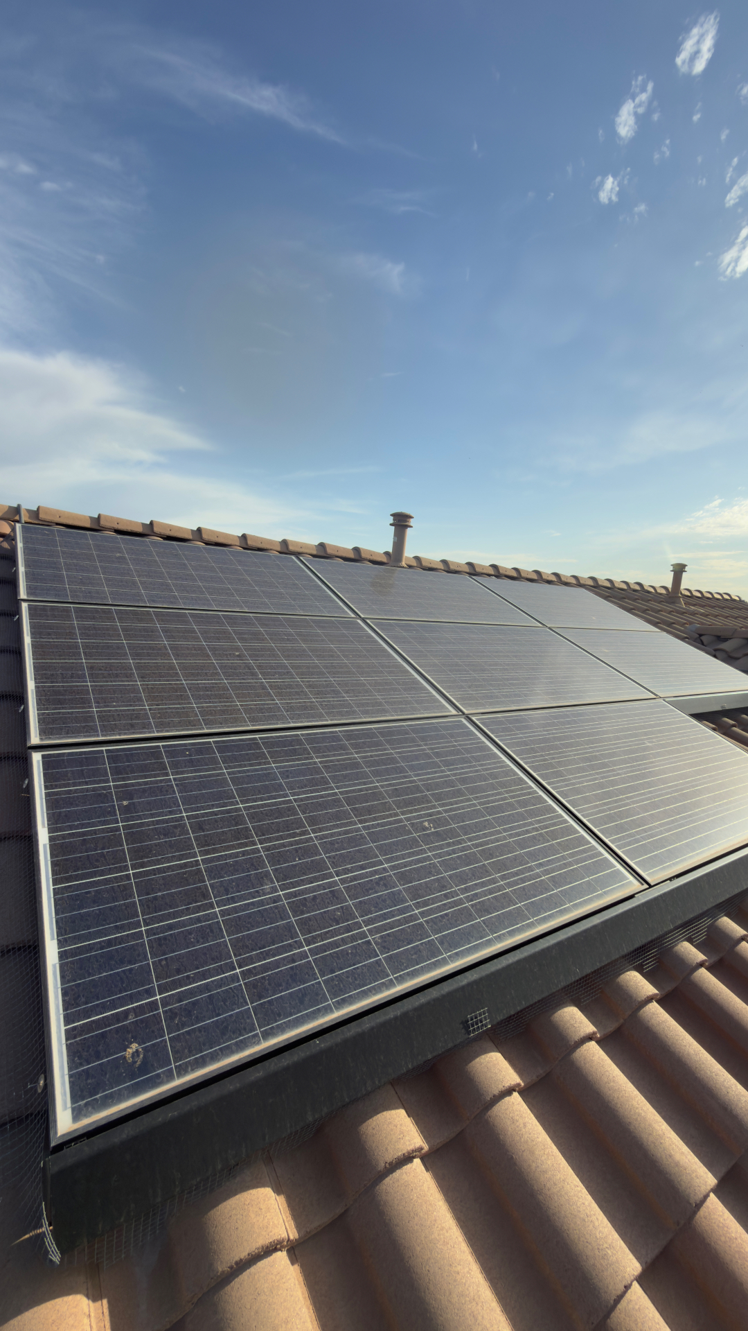 Dusty solar panel array before cleaning